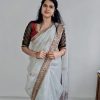 silver organza saree with brown velvet blouse and zari border