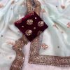 silver organza saree with brown velvet blouse and zari border