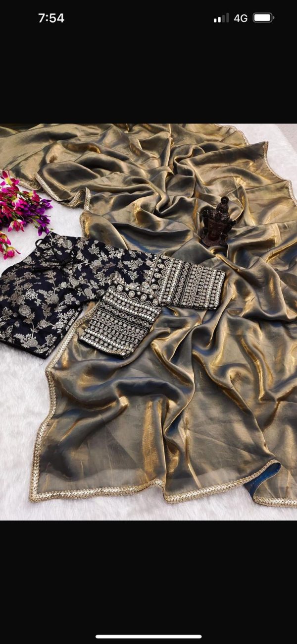 Copper tissue saree with embroidered black blouse