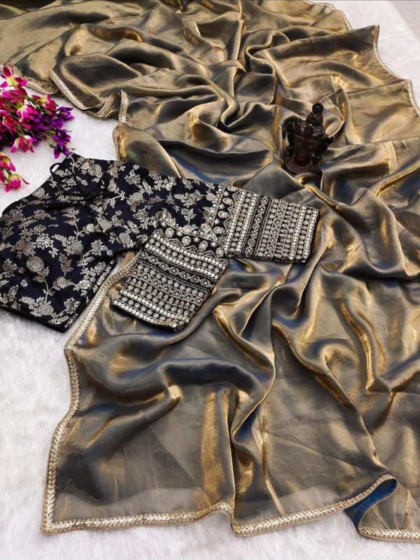 Copper tissue saree with embroidered black blouse